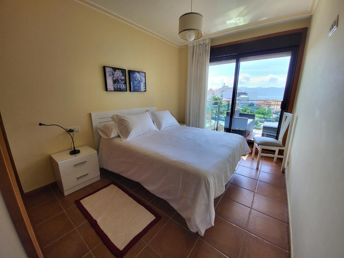 Apartamento Antopa Con Entrada Directa A La Playa - Karkava Travel Sanxenxo Eksteriør billede